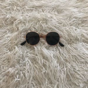 Black rounded glasses